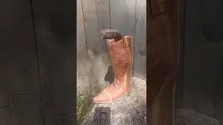 Awesome Western boot and Rattler carving