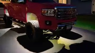 2016 lifted GMC Canyon with black label rock lights 20x12 -44 offset 33x12.5 nitto ridge grapplers