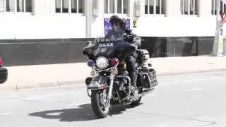 Sprint Cup driver Kevin Harvick gives Mayor Betsy Price a ride