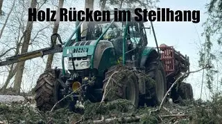 Holzrücken mit Steyr Forstschlepper und 16 t Rückewagen im Steilhang