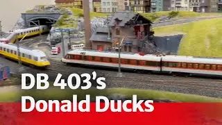 M&auml;rklin HO DB 403&rsquo;s crossing paths on Luneberg &ndash; Donald Duck