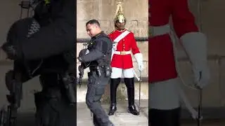 Armed Policeman protects the King&rsquo;s Guard, #shorts