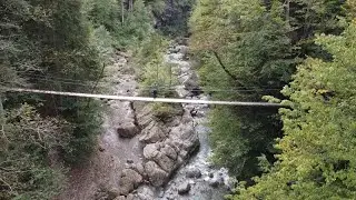 Erlebnis Bregenzerwald: Wackeliger Drahtseilsteg 15 Meter &uuml;ber der Subersach Lingenau Drone Footage