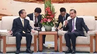 FM Wang Yi meets secretary general of Japan's ruling party in Beijing