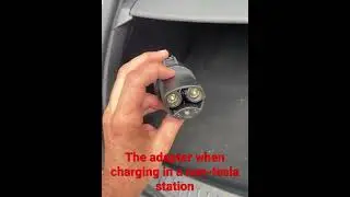 Where to find your adapter when charging at a non-Tesla station.