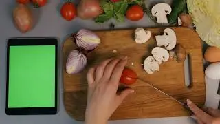 4K Kitchen Green Screen | woman cutting vegetables on the chopping board in the kitchen