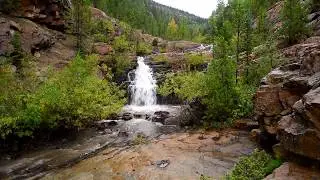 Rainy Afternoon Waterfall Scene
