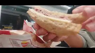 On the train eating sandwich.I love catching by train, so relaxing.