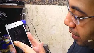 محاوله اصلاح ايفون 6 معلق على شعار ابل علامة التفاحة