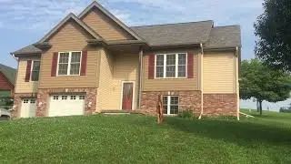 Mostly seamless Provia Vinyl siding and vinyl wood shingle look accent siding panels by Blair Ne
