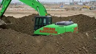 A Green Excavator Digs a Deep Hole, and the Outcome Shocks Everyone