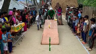 উঁচু থেকে চাকা গড়িয়ে বোতলের টাওয়ার ভাঙ্গার কঠিন চ্যালেঞ্জ। কতজন পুরস্কার জিতে নিলো দেখুন ?