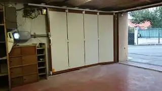 Porte de garage lat&eacute;rale GYPASS avec motorisation CAME type V6000
