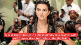 Kendall Jenner dazzled in a '20s inspired McQueen dress with gold fringe and a spiked collar