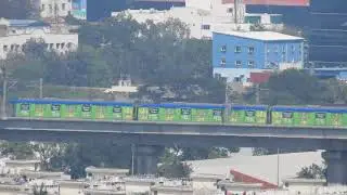 Minute maid advertisement covered Chennai metro train rushing towards Ekkaduthangal Metro station