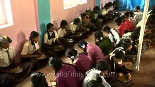 Primary school children receive midday meal in Karnataka