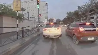 Girl driving brezza producing black smoke.