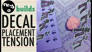 Tense Model Making Moment - Putting Eye Decals on a Blank Face Plate