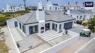 A brand new home that elevates everyday living in Shelley Point Golf Estate