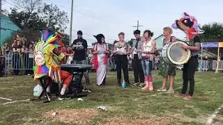 The NOLAW Anti-State Choir performing at the Human Horse Races 2024