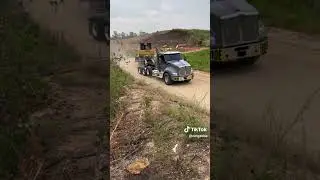 Kenworth T880 day cab heavy haul, hauling a CAT bulldozer