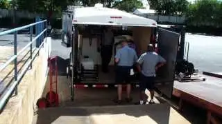 Enclosed trailer with a Hydro Tek's 3500 PSI @ 9 GPM hot water pressure washer & AZV88