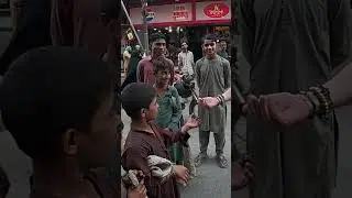 Playing a Game with Pakistani Beggar Kids 🇵🇰 #travel #pakistan #beggars #fun