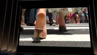 Candid Feet In Low Mule Sandals Walking In The City 
