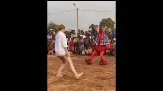 African Masquerade Dance with a White Lady #agbatvspecial #masquerades #africandance