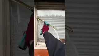 Window cleaning drive thru window