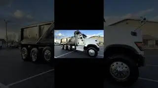 TRI-AXLE DUMP TRUCK
