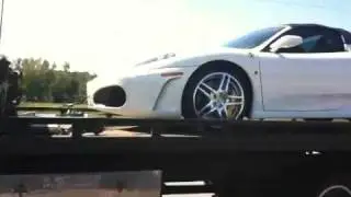 Ferrari on a tow truck