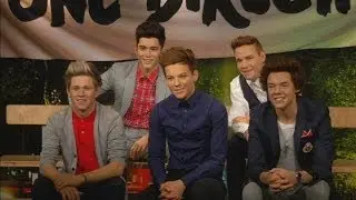 One Direction unveiled in their wax models at Madame Tussauds Tokyo