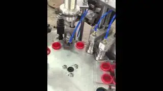 Cap folding and lining machine