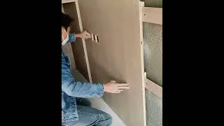 Wooden wall panel installation with french cleat by newspacehospitality