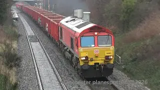 DB UK Class 66001 On 6V06 On Red Stone Boxes Is Seen Passing At Wilnecoate On The 06/02/2026