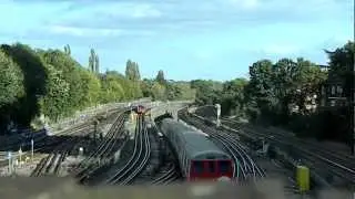 London Underground Metropolitan Line 5062 and 5034 descend into Neasden