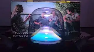 Harman Kardon Aura Studio 5 playing various music genres