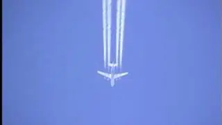 An 124 flying at cruising level with contrail