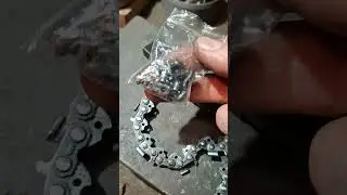 je r&eacute;pare une cha&icirc;ne de tron&ccedil;onneuse avec des outils de aliexpress