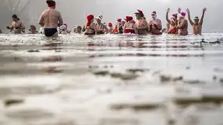 Verrückte Tradition: Eisbaden im Orankesee bei Berlin bei 1 Grad Wassertemperatur