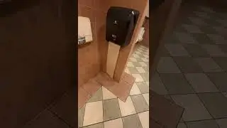 Opposite day paper towel dispensor