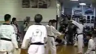 Young's TKD Jonathan Koh board breaking