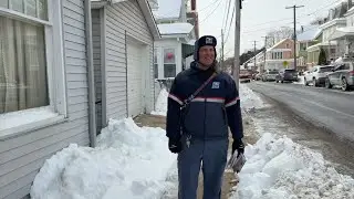 Dedicated postal worker braves elements to deliver mail through challenging winter weather