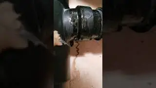 ABS drain pipe leak.  Crack at the T