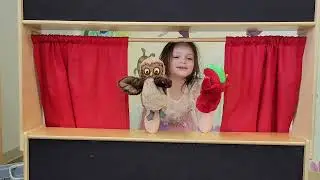 Fiona presents a puppet show