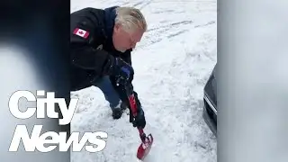 Premier Doug Ford helps Toronto dig out