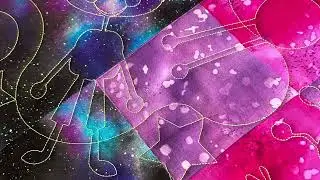 A panel quilt customized using a pantograph