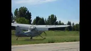 Cessna O-1E Bird Dog Grass Landing