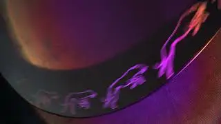 Running animation etched into mirror